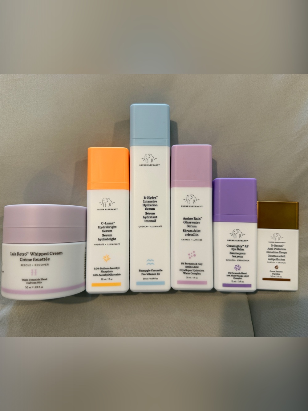 Drunk Elephant Multi-Product Skincare Set - Pastel Purple, Blue, Orange